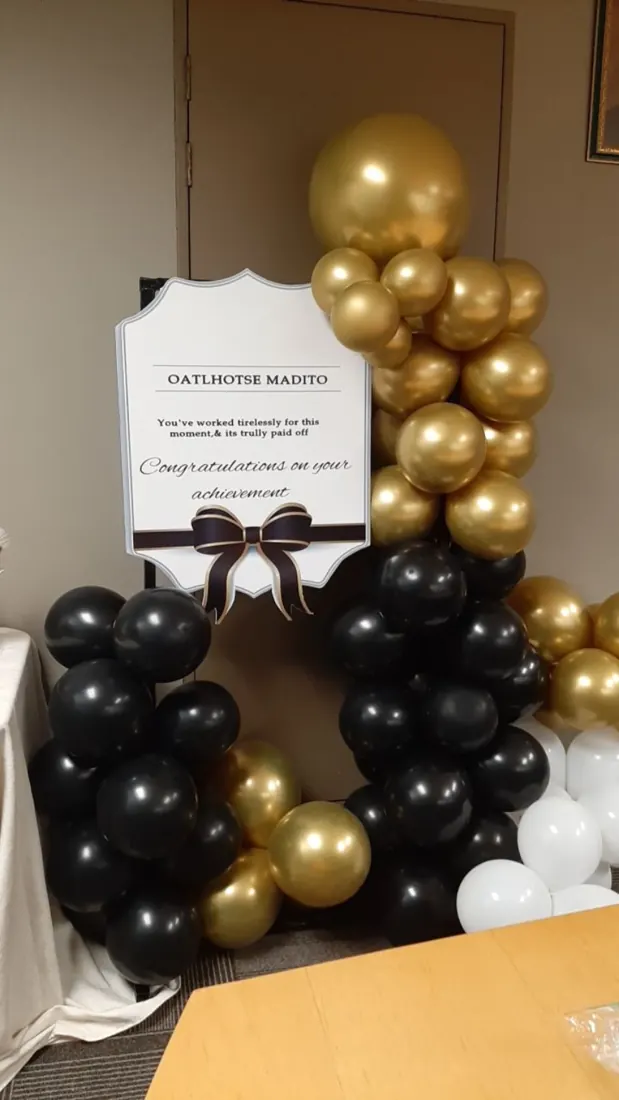 Black & Gold Celebration. Classic black and gold balloons bring a sense of occasion and delight.
