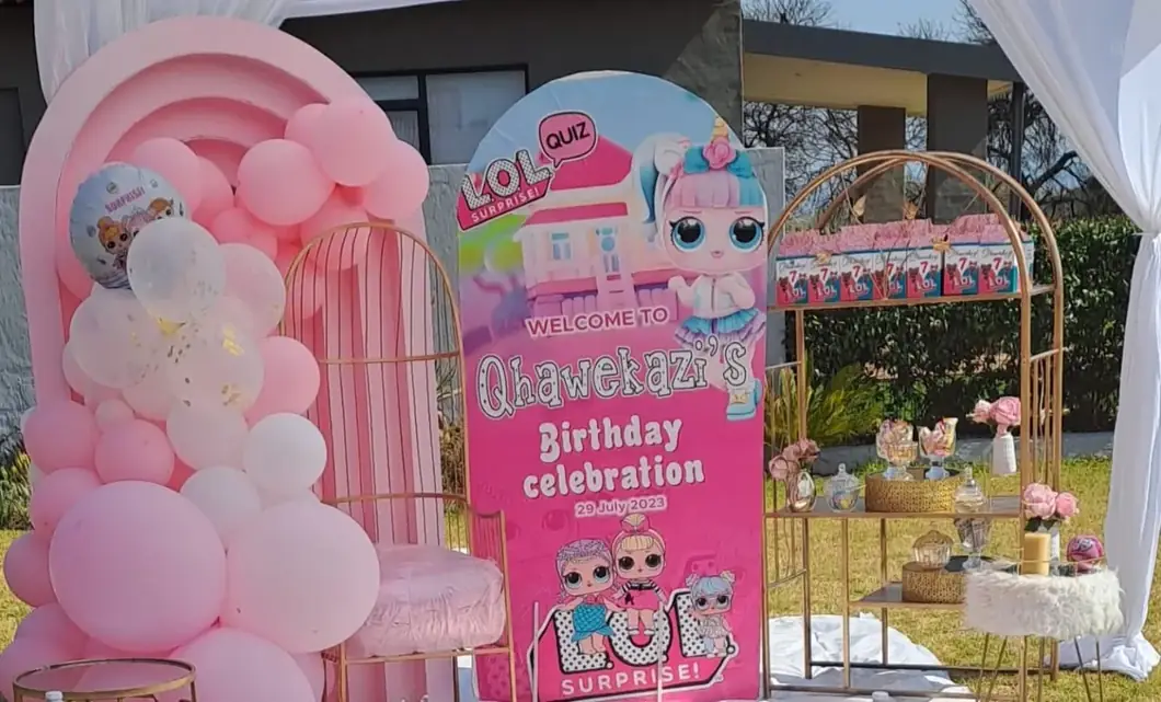 Pink Birthday Wonderland. Playful pink styling and statement balloon arrangements create an unforgettable welcome.
