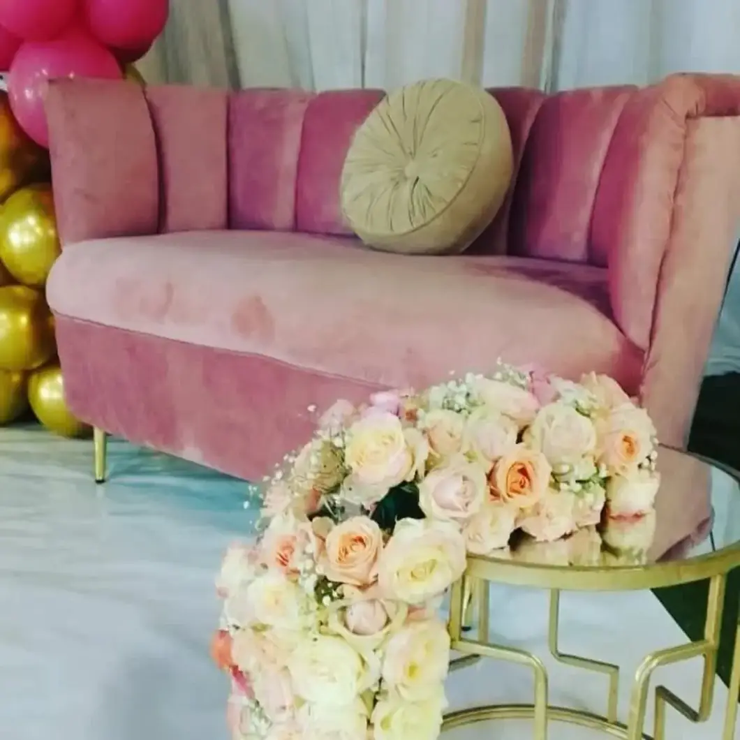 Blush Velvet Lounge. Soft blush velvet and floral accents bring romance to the guest experience.